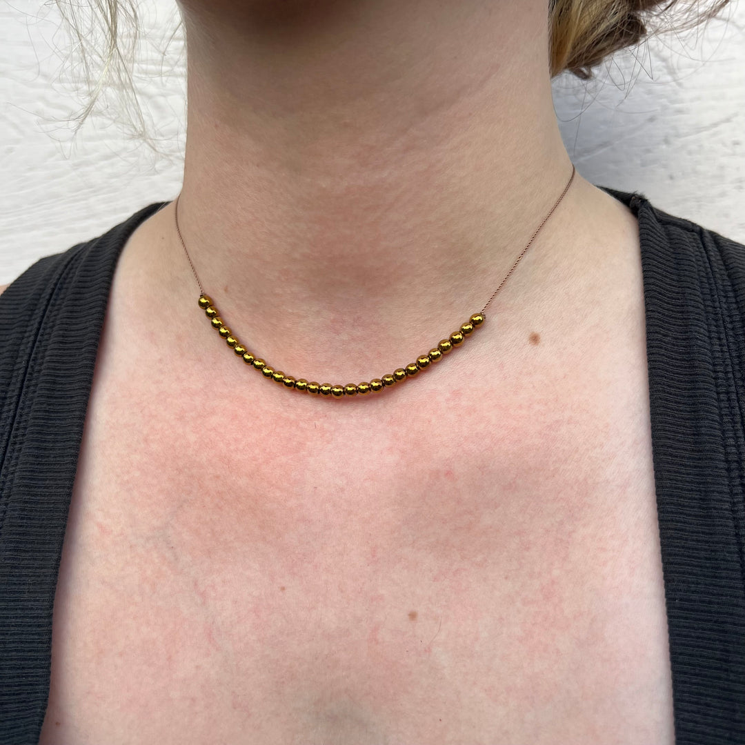Hematite Gold Cord Necklace